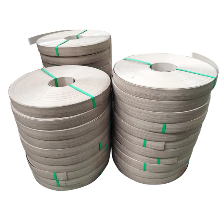 PVC edge banding rolls packed with green straps